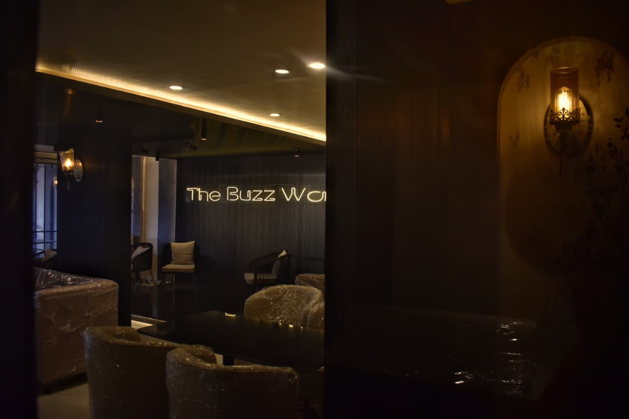 The Buzz Wall neon sign